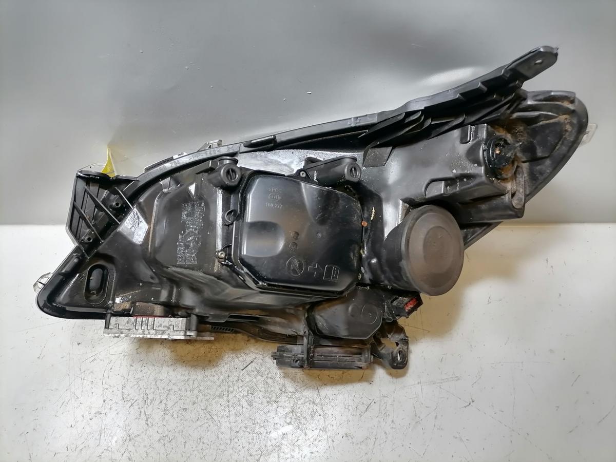 Opel Astra H original Xenonscheinwerfer rechts mit Kurvenlich schwarzer Hintergrund Bj.2009